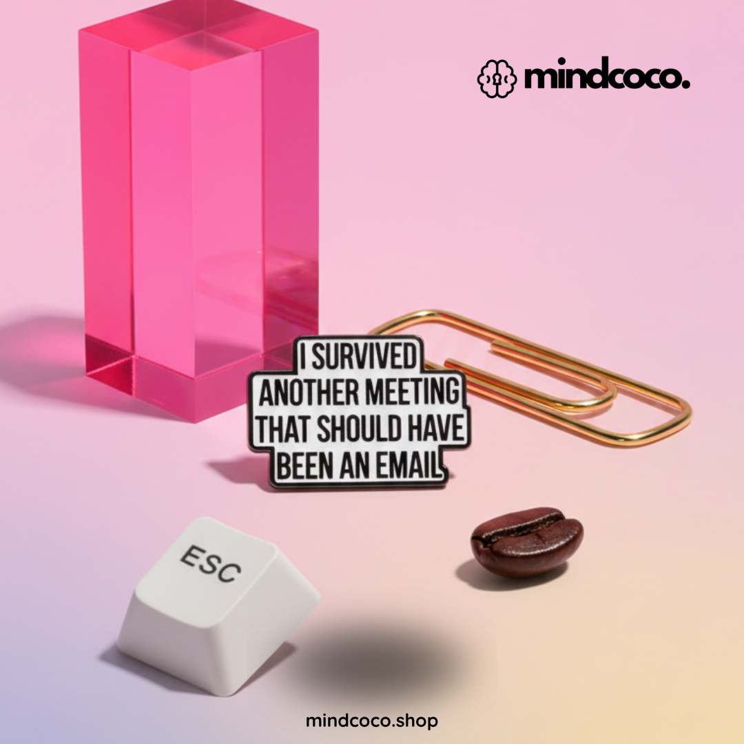 "Survived Meetings" enamel pin – lifestyle flat lay, neurodivergent and mental health humour