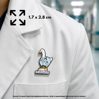 Person holding "I'm A Duckctor" enamel pin showing 3×3cm size