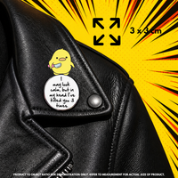 Person holding "I May Look Calm" enamel pin showing 3×3cm size