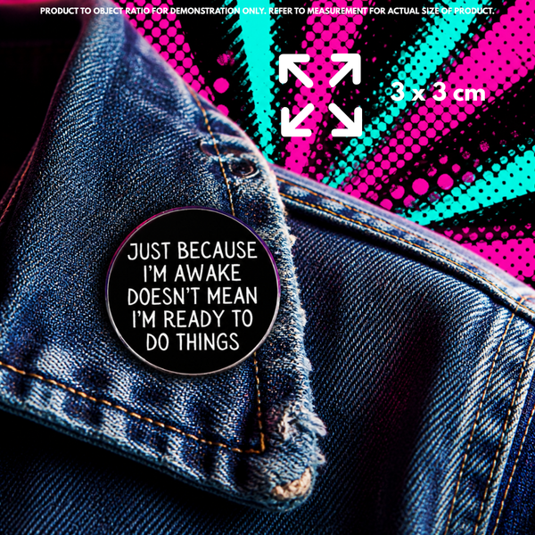 Person holding "Awake but Not Ready" enamel pin showing 3×3cm size