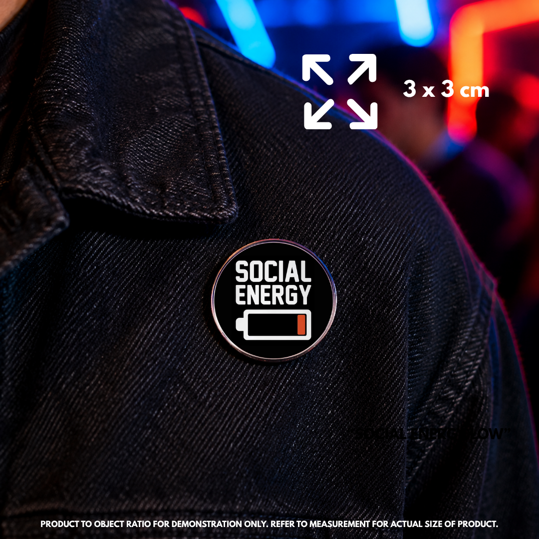 Person holding "Social Battery" enamel pin showing 3×3cm size