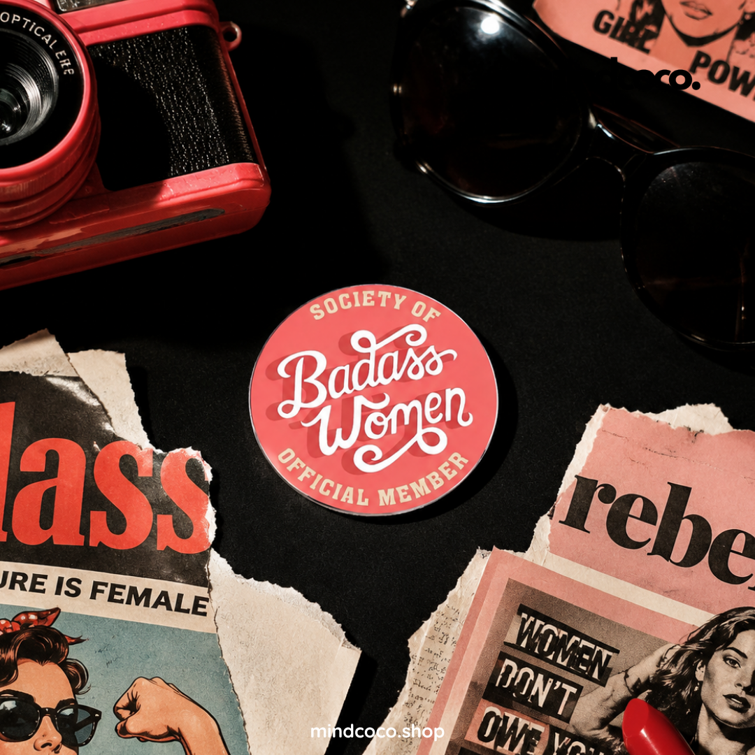 "Society of Badass Women" enamel pin – lifestyle flat lay, neurodivergent and mental health humour