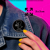 Person holding "Tea-Rex" enamel pin showing 3×3cm size