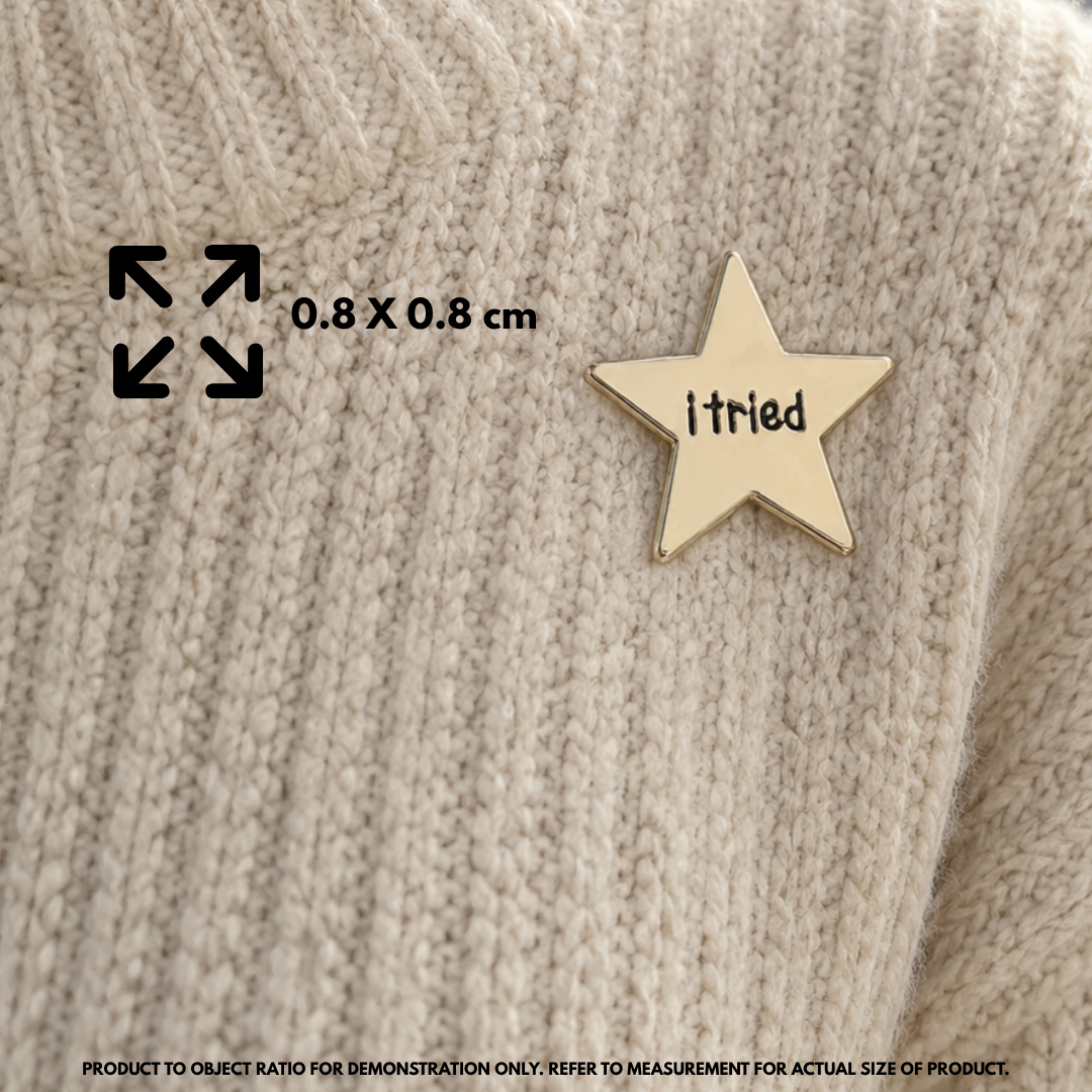 Person holding "I Tried" enamel pin showing 3×3cm size