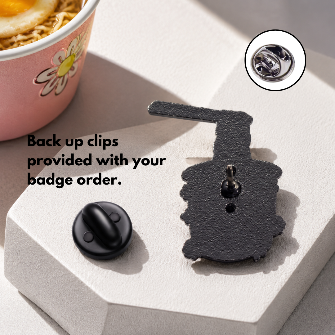 "Instant Good Vibes" enamel pin worn on jacket – neurodivergent and mental health humour