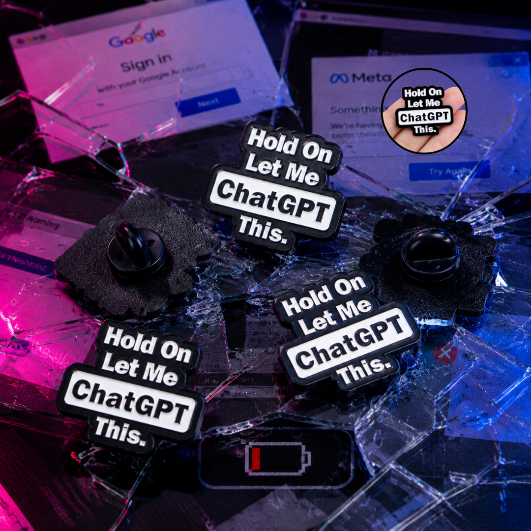 "Hold on, Let me ChatGPT this" enamel pin worn on jacket – neurodivergent and mental health humour