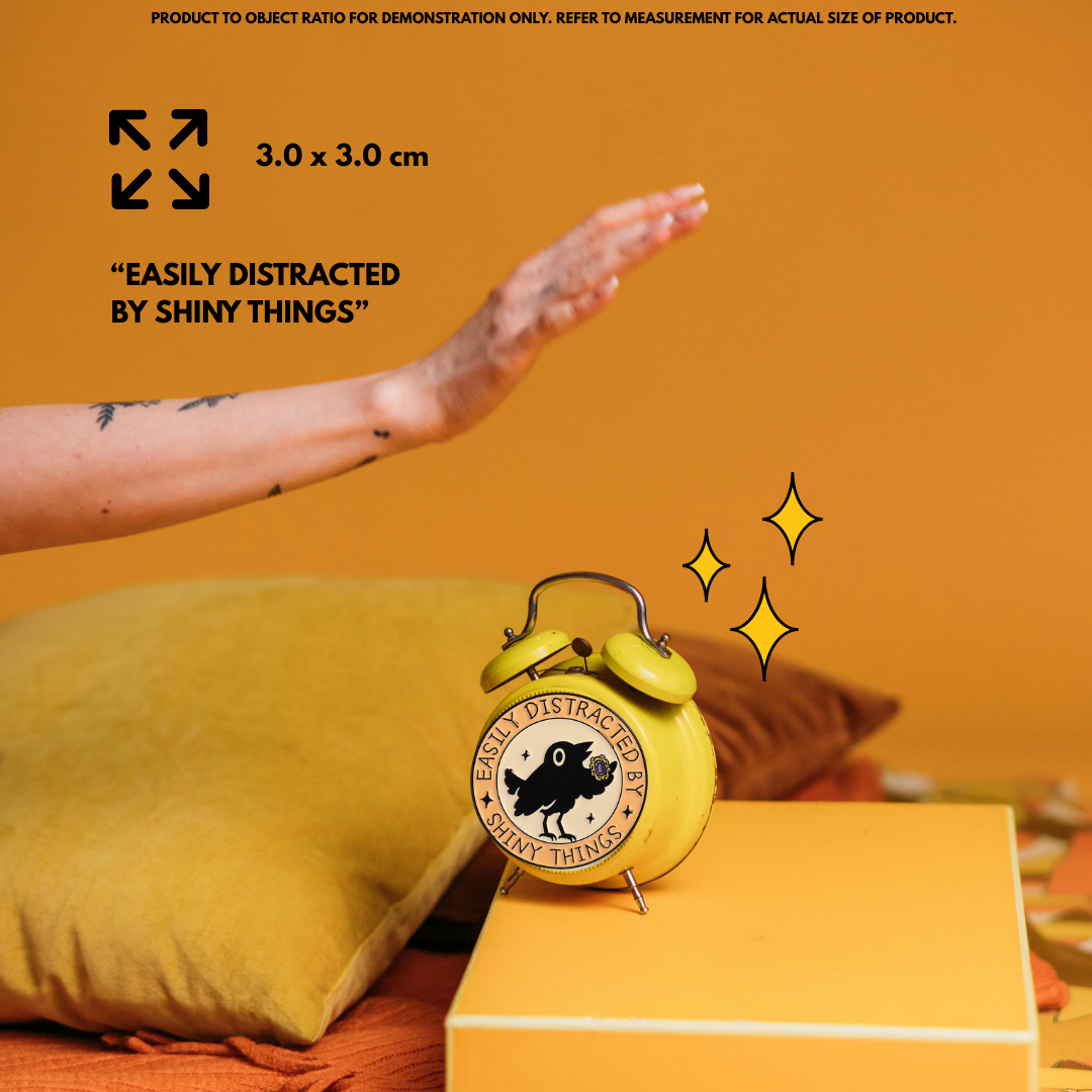 “Easily Distracted by Shiny Things" - Communication Pin Badge