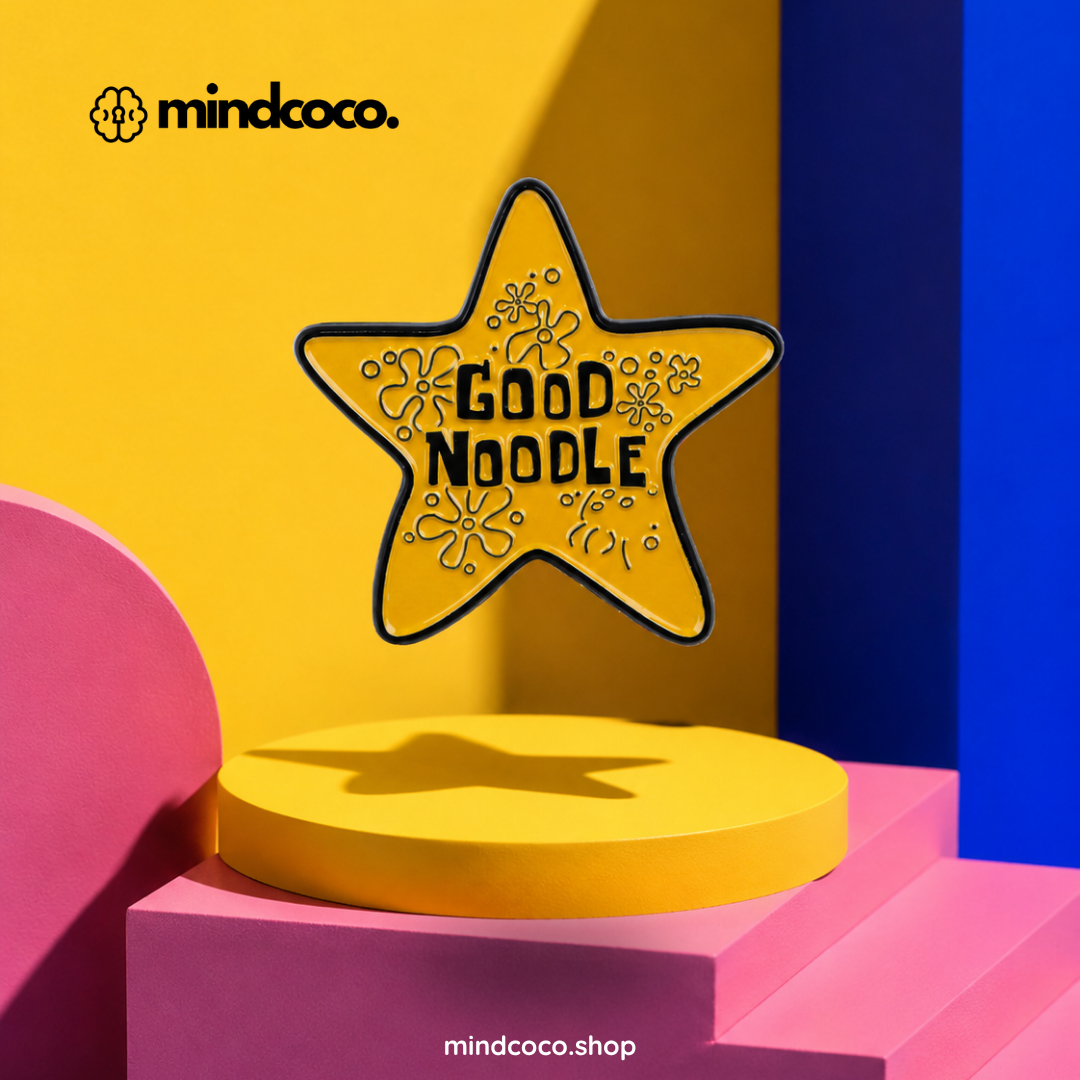 "Good Noodle" enamel pin – lifestyle flat lay, neurodivergent and mental health humour