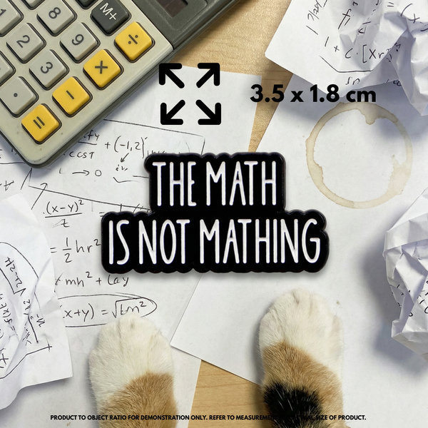 Person holding "The Math is Not Mathing" enamel pin showing 3×3cm size