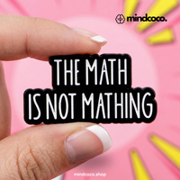 "The Math is Not Mathing" enamel pin – lifestyle flat lay, neurodivergent and mental health humour