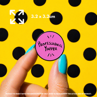 Person holding "Professional Yapper" enamel pin showing 3×3cm size