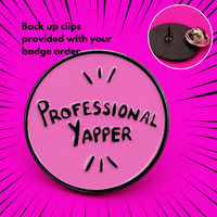 "Professional Yapper" enamel pin worn on jacket – neurodivergent and mental health humour