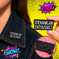 "SHENANIGAN ENTHUSIAST" enamel pin worn on jacket – neurodivergent and mental health humour