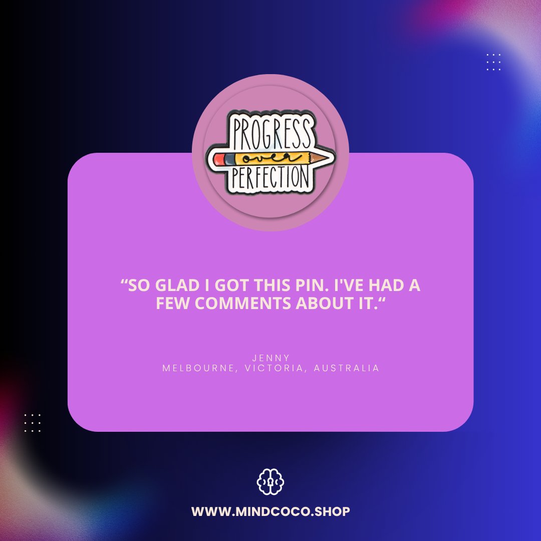 Customer review photo – "Progress Over Perfection" enamel pin, 5-star community favourite