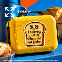 Person holding "I tolerate a lot of things but not gluten" vinyl sticker showing 7.6×7.6cm size